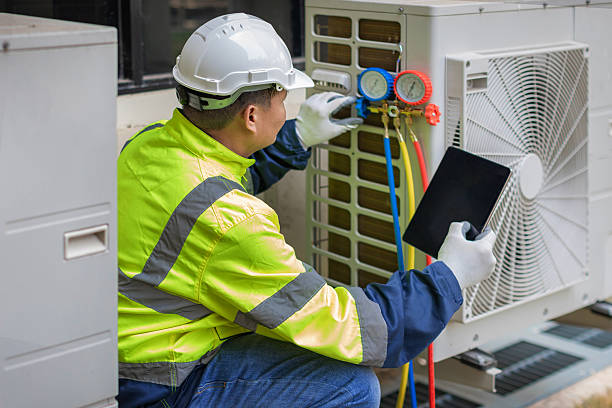 Professional Air Conditioning Repair technician working in Marion, NC